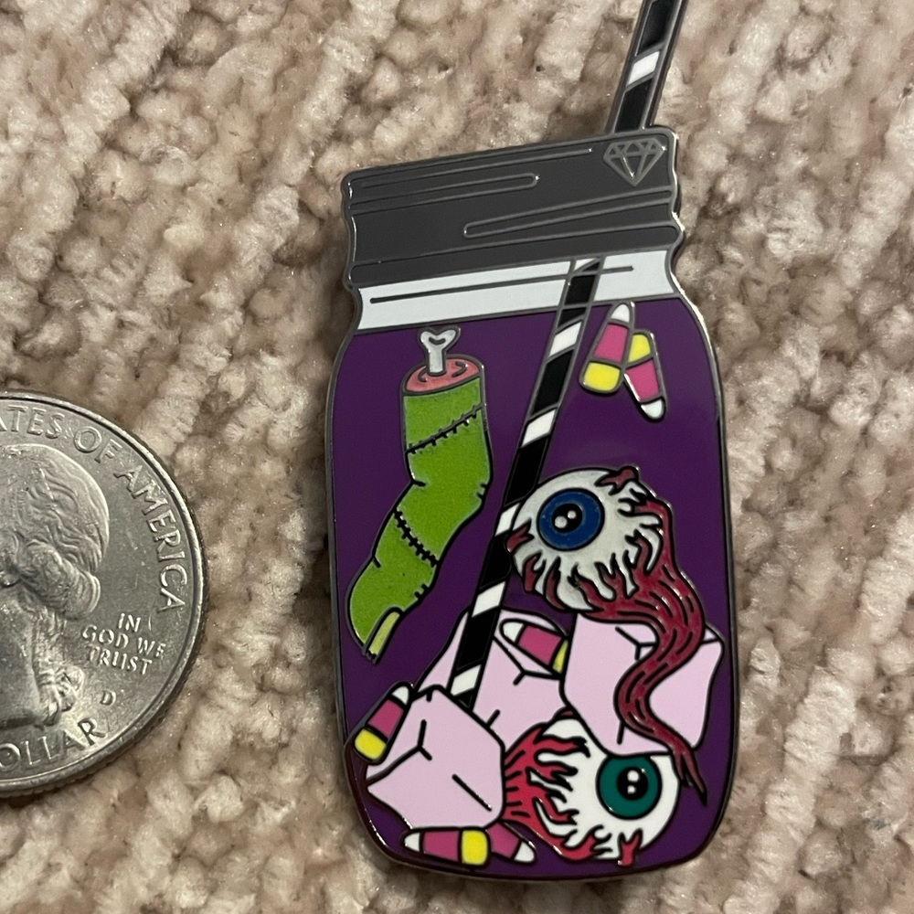 Eyeball lemonade pin